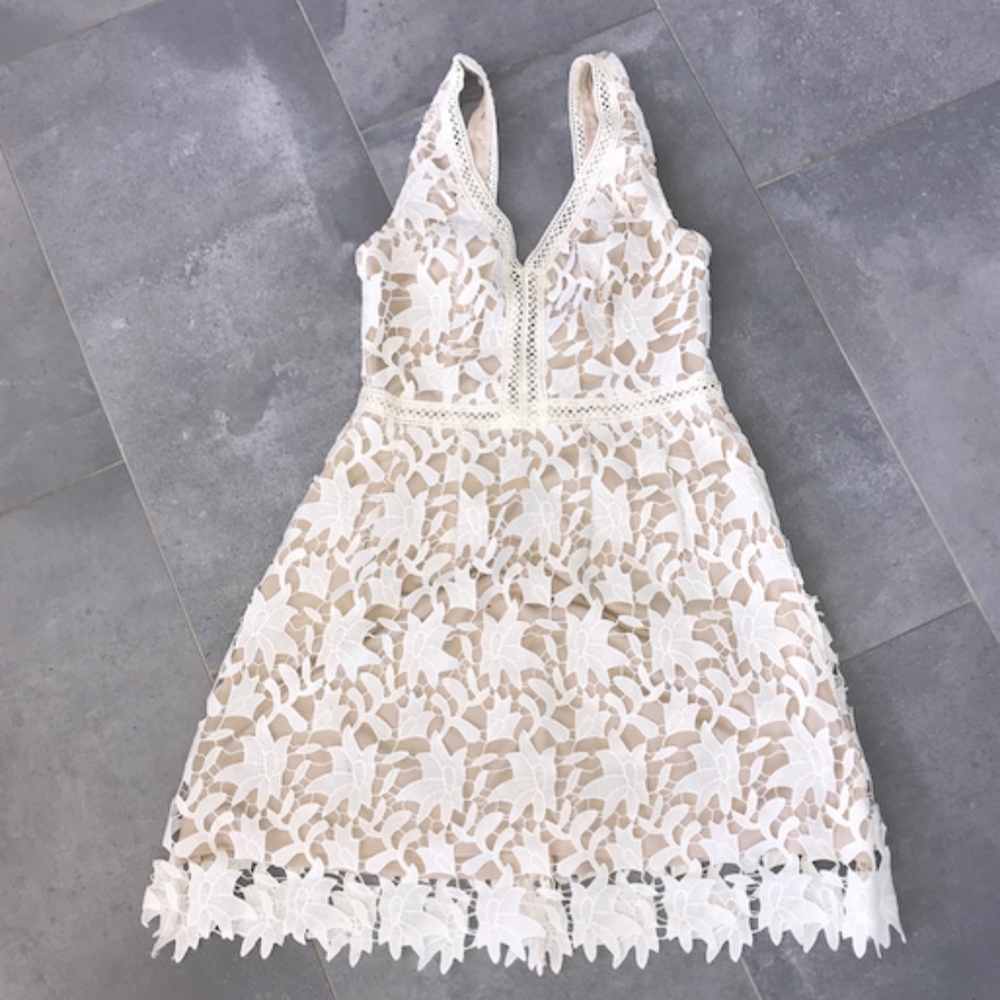 White and Tan Lace dress in a size small.